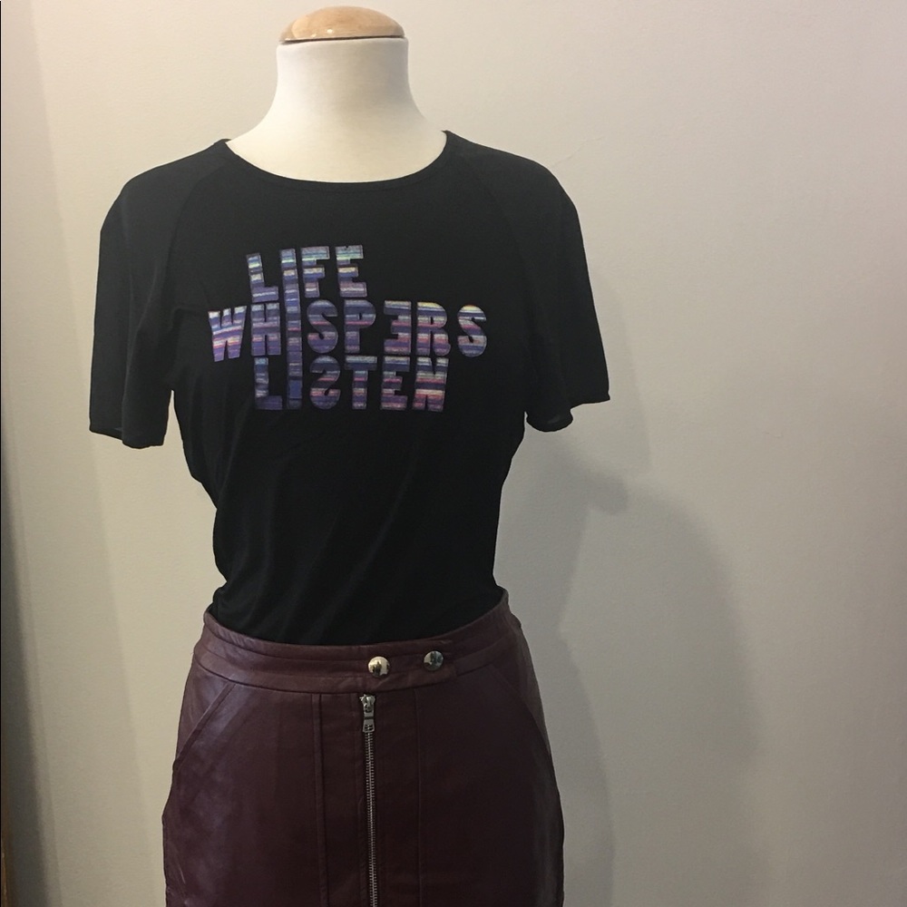 Tshirt with slogan “life whispers”
